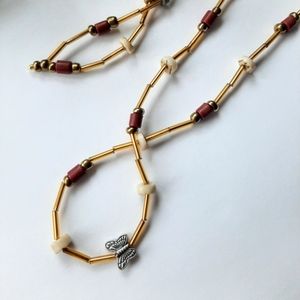 Long gold beaded necklce